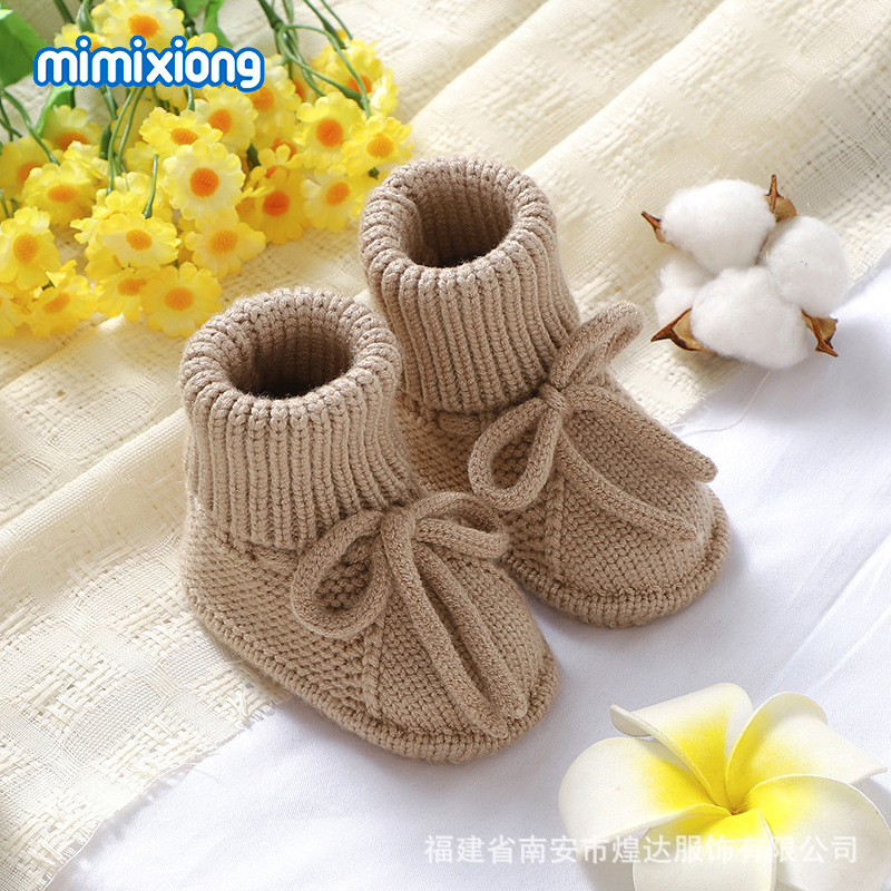 Ins venta caliente otoño e invierno nuevo bebé color sólido lindo lazo de punto zapatos para niños pequeños calcetines de piso de punto de lana