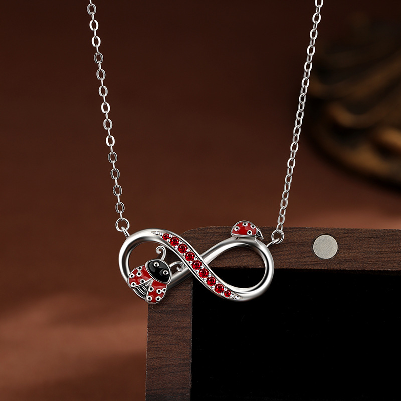 S925 plata de ley, símbolo infinito, collar de mariquita, lujo ligero femenino, nicho, sentido de alta gama, cadena de clavícula de comercio exterior de Amazon europea y americana