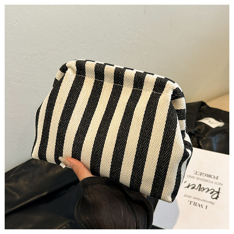 New cross-border fashion color-blocking striped cosmetic bag, women's loose change mobile phone storage bag, trendy and niche cloud clutch undefined