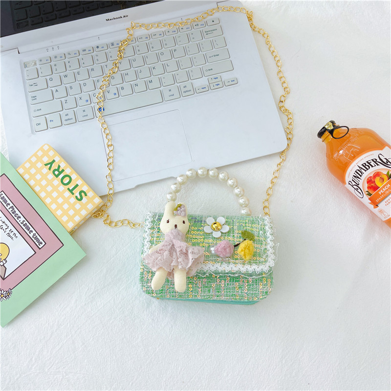 Estilo coreano de los niños bolsa pequeña de Kindergarten niñas mini bolso 2023 nueva cadena de conejito de dibujos animados bolsa de hombro