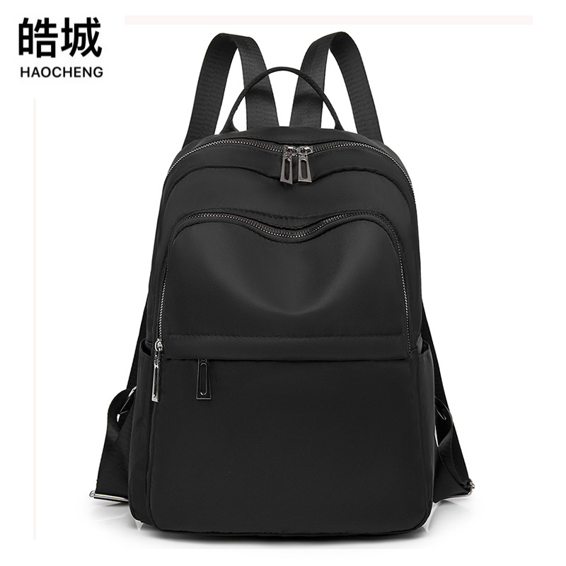 Venta al por mayor 2023 verano nuevo estilo coreano casual Oxford tela para mujer mochila de viaje de gran capacidad de moda