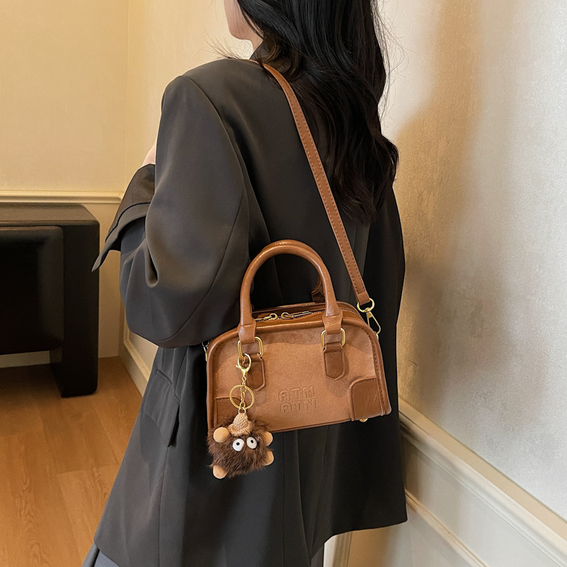 Cross-border retro bolso de mano mujer 2026 nuevo popular bolso de viaje nicho de hombro mochila