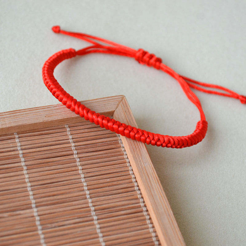 Woven red rope bracelet handmade