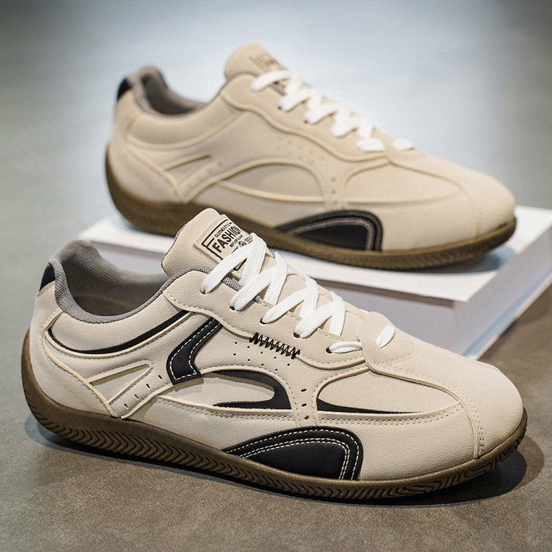 Zapatos de hombre 2025 tendencia de otoño versátil zapatos deportivos de skate de trabajo nicho de invierno ligero con suela suave zapatos de moda de entrenamiento alemán