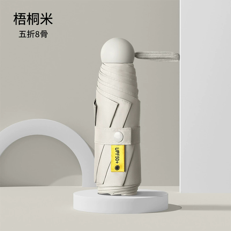 Sombrilla de protección solar exclusiva transfronteriza con descuento de cinco veces más para mujer, compacta y portátil, protección solar, sombrilla de bolsillo ultrapequeña para niñas, de doble uso para sol y lluvia.