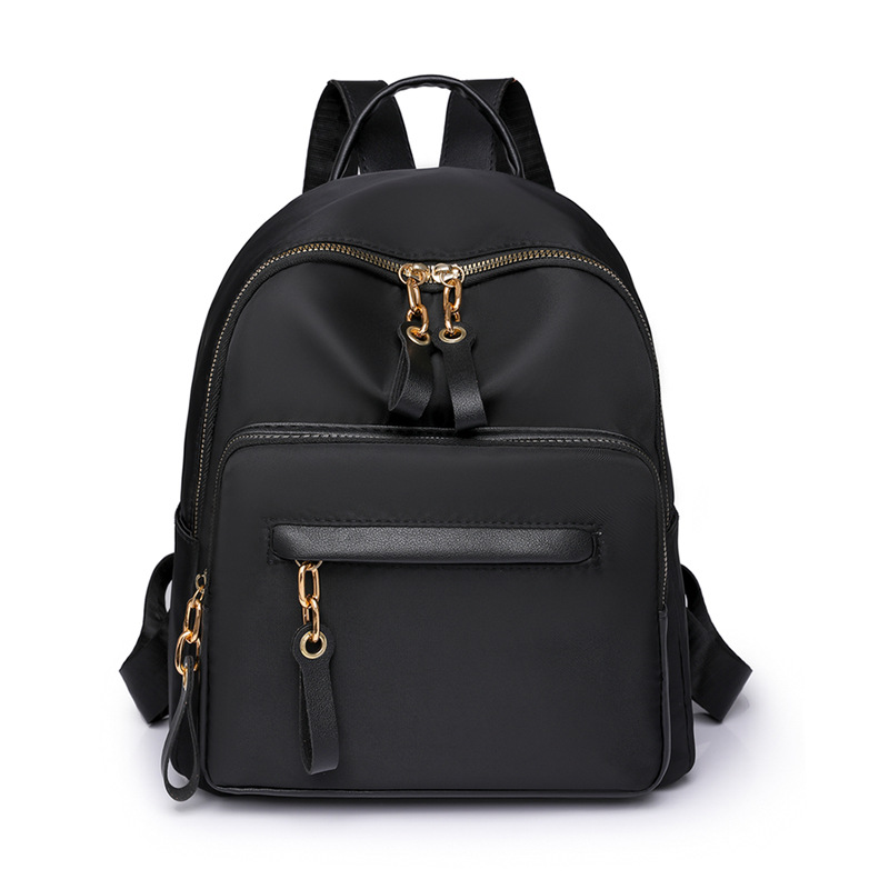 Bolsos para mujer 2023 nueva mochila de nylon para mujer coreana moda contraste color al aire libre mochila de viaje ligera al por mayor