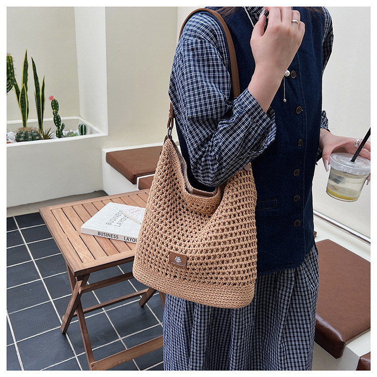 Summer hollowed-out knitted underarm bag for women, 2025 new style, laid-back and relaxed, seaside vacation style single-shoulder crossbody bag undefined