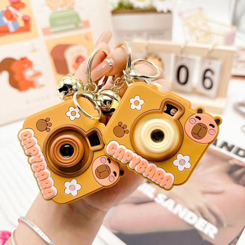 Cross-Border Popular Capibala Projection Camera Brown Bell Keychain Pendant Toy Manufacturer Direct Sale