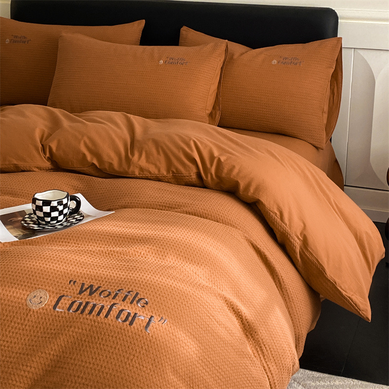 Estilo de clase A algodón waffle bordado de cuatro piezas conjunto simple 100 algodón hoja de cama edredón cubierta hoja equipada 4-piezas conjunto lote