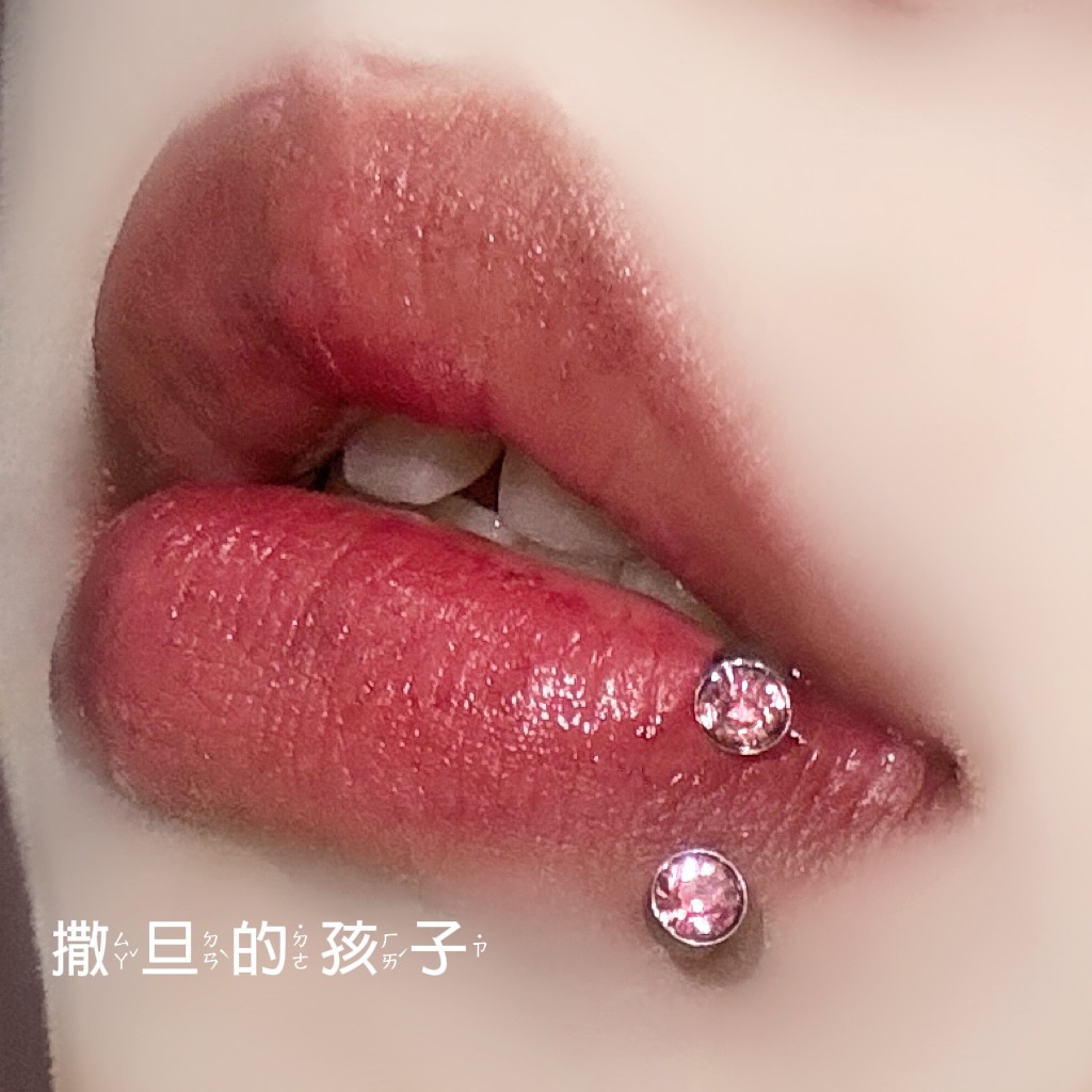 Pointed labret stud close-up product detail