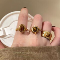 ハイエンドのライトラグジュアリーニッチデザインゴールデンひまわりタイガーアイリング女性用2025新しいインターネットセレブユニークなヨーロッパとアメリカのメラ