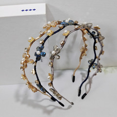 Delicate crystal flower vintage Japanese-Korean hairband for women, trendy and dreamy Korean-style headband—versatile and perfect as a Korean hair accessory.