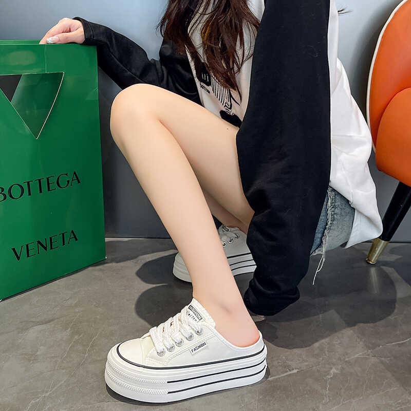 2025 verano y otoño nuevo sin talón versátil transpirable mallas perezosas zapatos blancos para mujeres