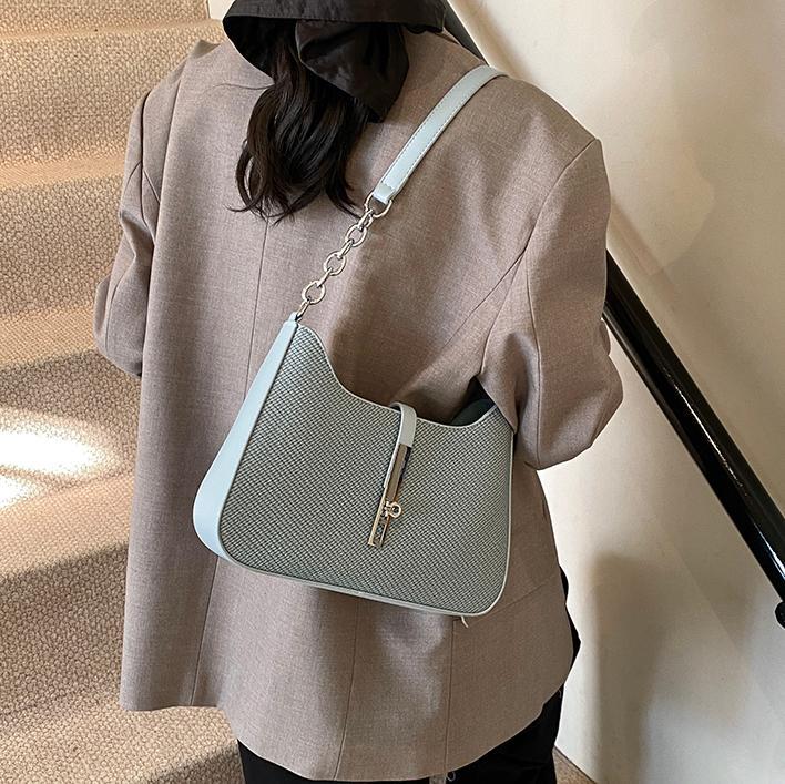 Nicho de diseño simple y versátil bolso de braza para mujeres 2025, nuevo estilo de alta calidad bolso de hombro de moda bolso de trabajo de viaje de mujer