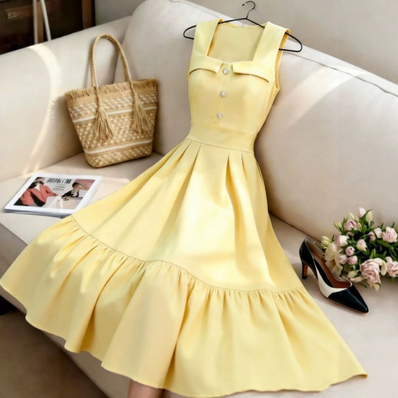 Goose Yellow French-Style Tank Dress with Square Neckline, Cinched Waist, Sleeveless, Pearl Button Embellishments, and Ruffled Hem in Gentle Goose Yellow Goose Yellow French-Style Tank Dress with Square Neckline, Cinched Waist, Sleeveless, Pearl Button Embellishments, and Ruffled Hem in Gentle Goose Yellow
