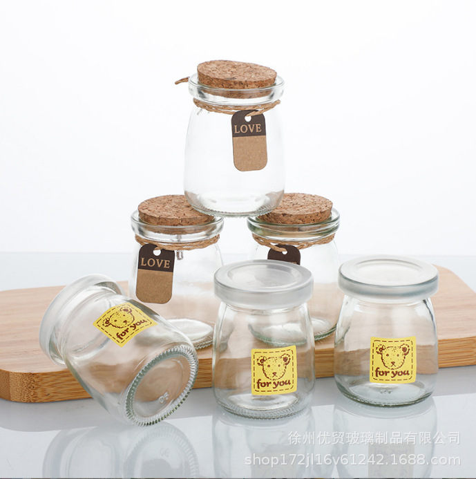 Venta al por mayor botella de pudín de vidrio de 100ml taza de leche gruesa botella de yogur resistente a altas temperaturas botella de vidrio de corcho