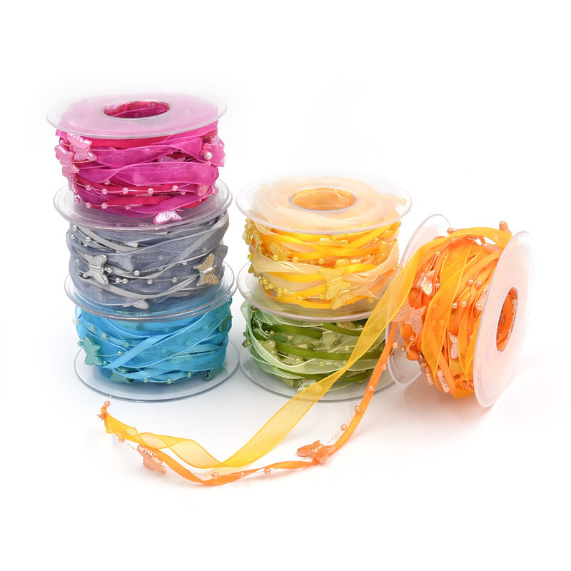 Nuevo transfronterizo primavera mariposa cadena de cuentas decoración cinta de mano material de jardinería de poliéster tejido a mano cinta