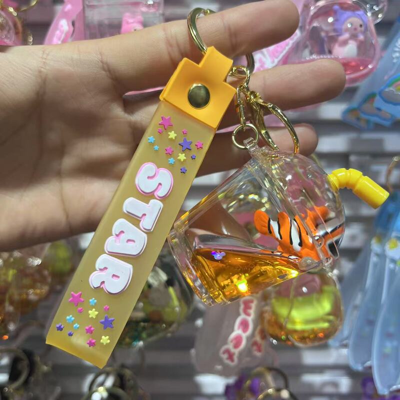 流砂ボトルキーホルダイルカ漫画オイルミルクティーカップ絶妙なかわいいペンダントクリスタルカップ漂流ボトルキーホルダー|undefined