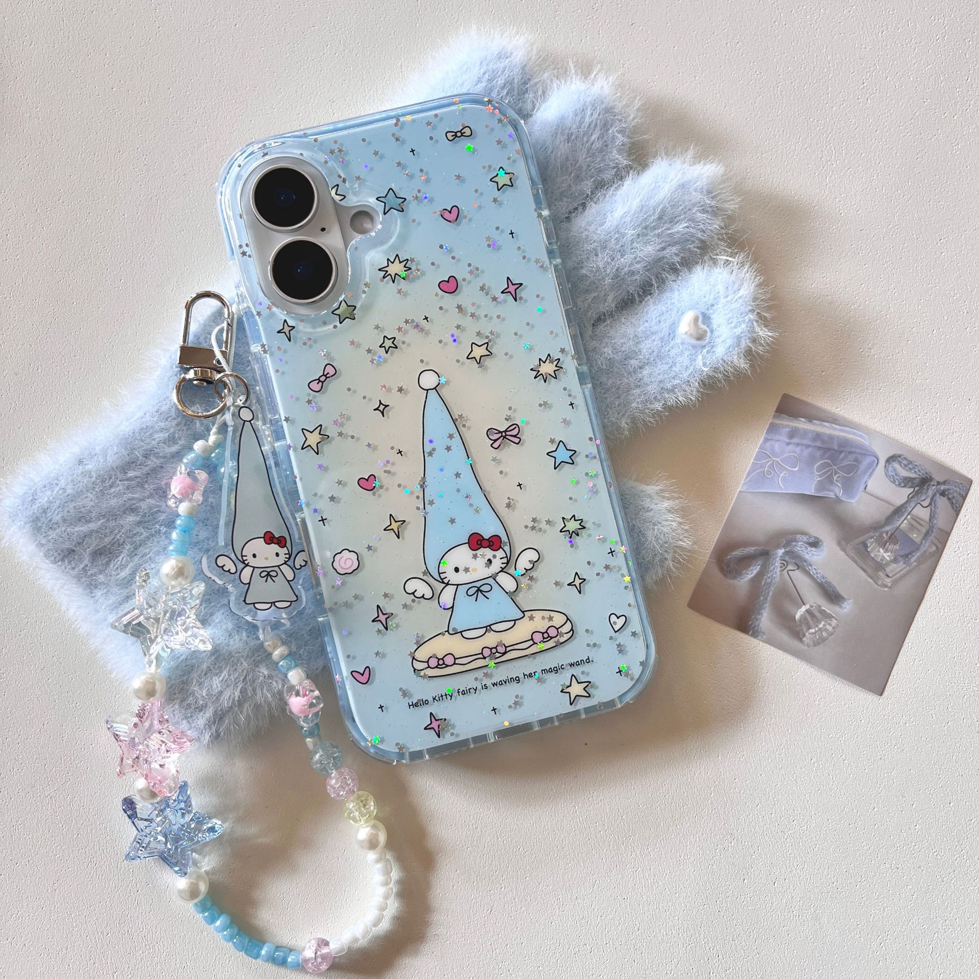 Nicho azul pequeña estrella fresca KT gato para Apple 15/16 funda para teléfono móvil cadena 14Pro 16PM nueva 13 mujer