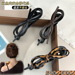 レトロな気質の蝶結びのツイストクリップの後頭部のヘアピンの女性の高級感のクリップの頭飾りのサメのクリップの平はカードの代わりになります。