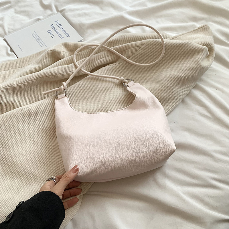 Bolso de diseño de nicho para mujeres este año, sensación de alto nivel de super caliente, bolso de hombro de moda, textura de bolso de cubo