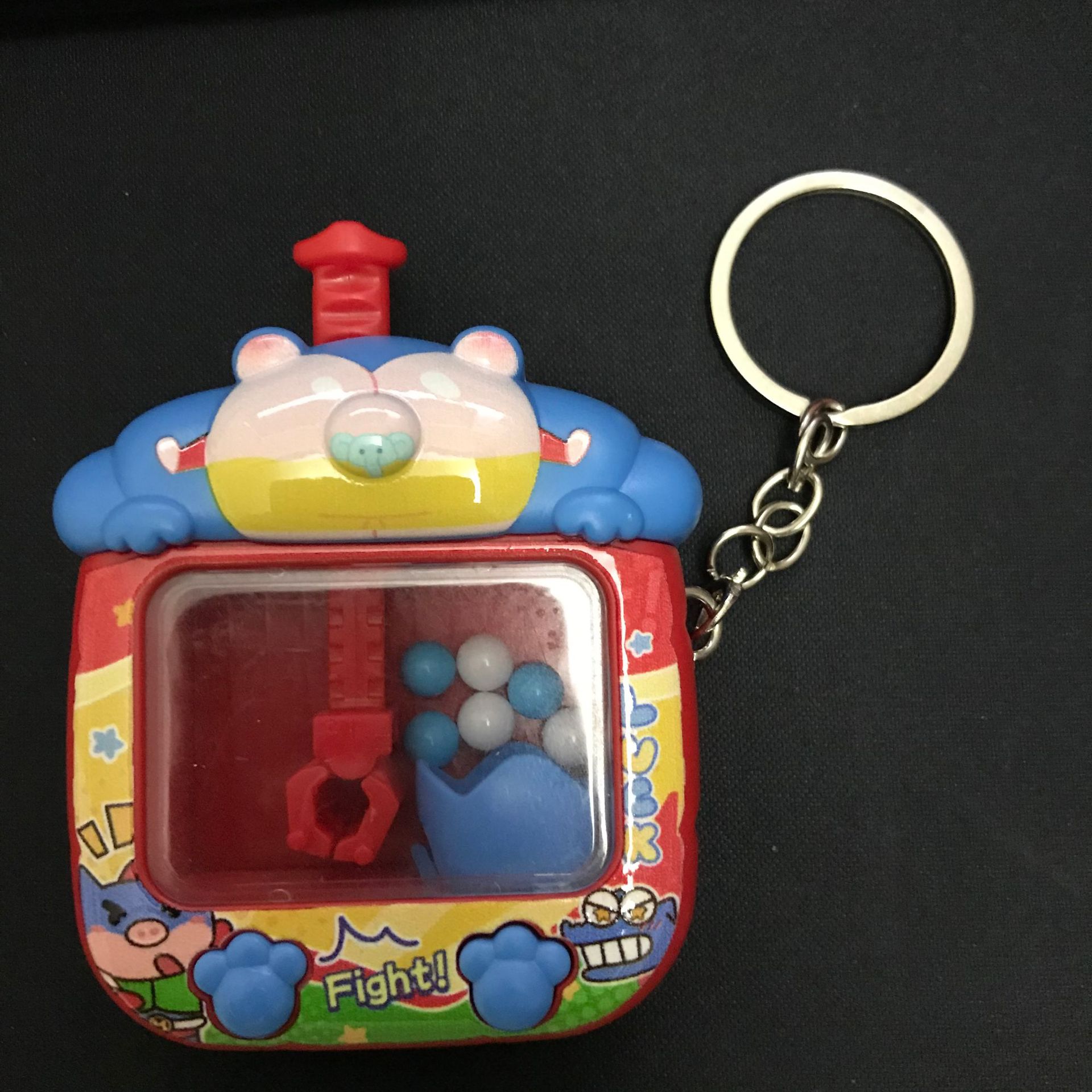 漫画のパンダのミニ柴犬が子供を捕まえるおもちゃのキーホルダー