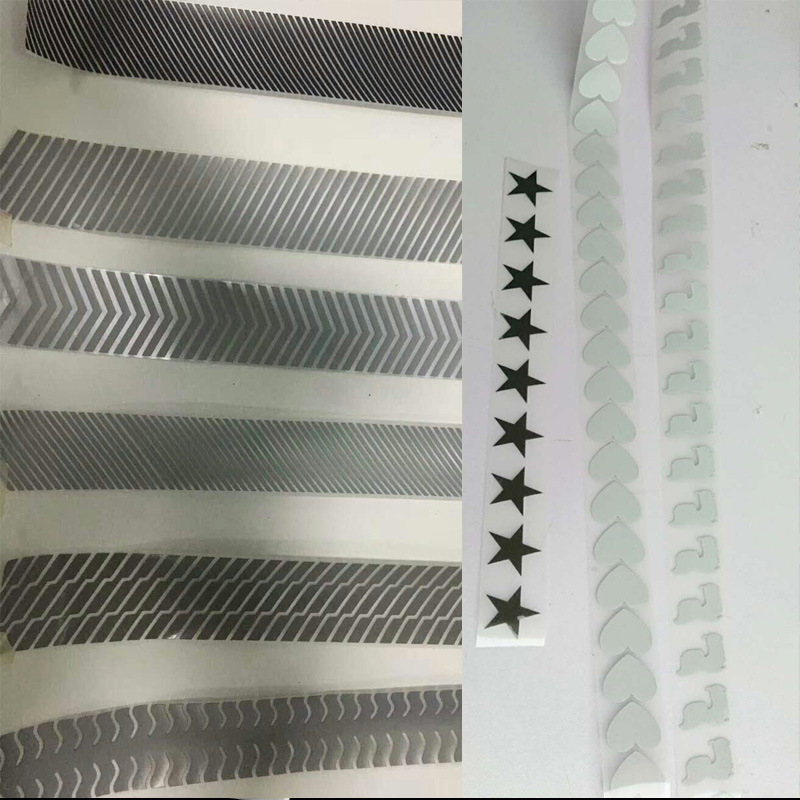 高亮加厚白底反光热帖膜银亮镂空连续斜纹热烫压服饰专用反光辅料