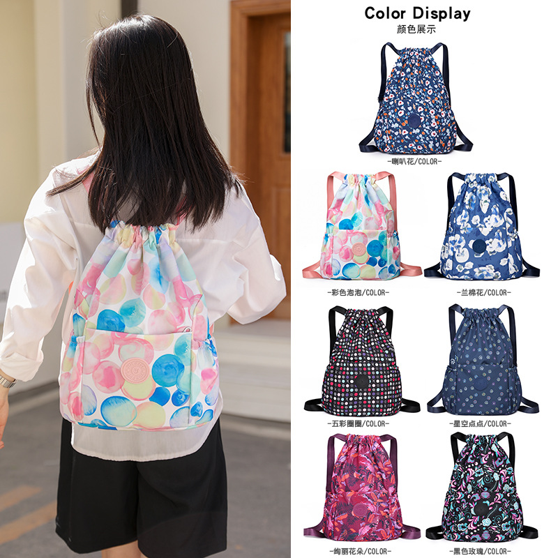 防泼水尼龙包新款抽绳女士双肩包时尚印花通勤包大容量户外旅行包