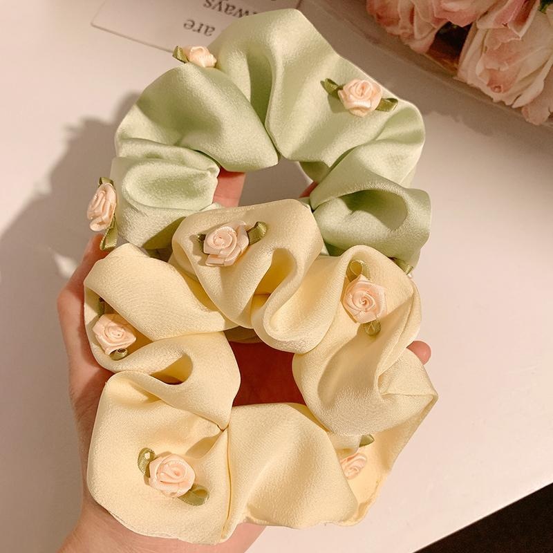 Flor dulce francesa collar de cabello de intestino femenino alta sensación coreana satén rosa cuerda de cabello cuerda de caballo baja tocado