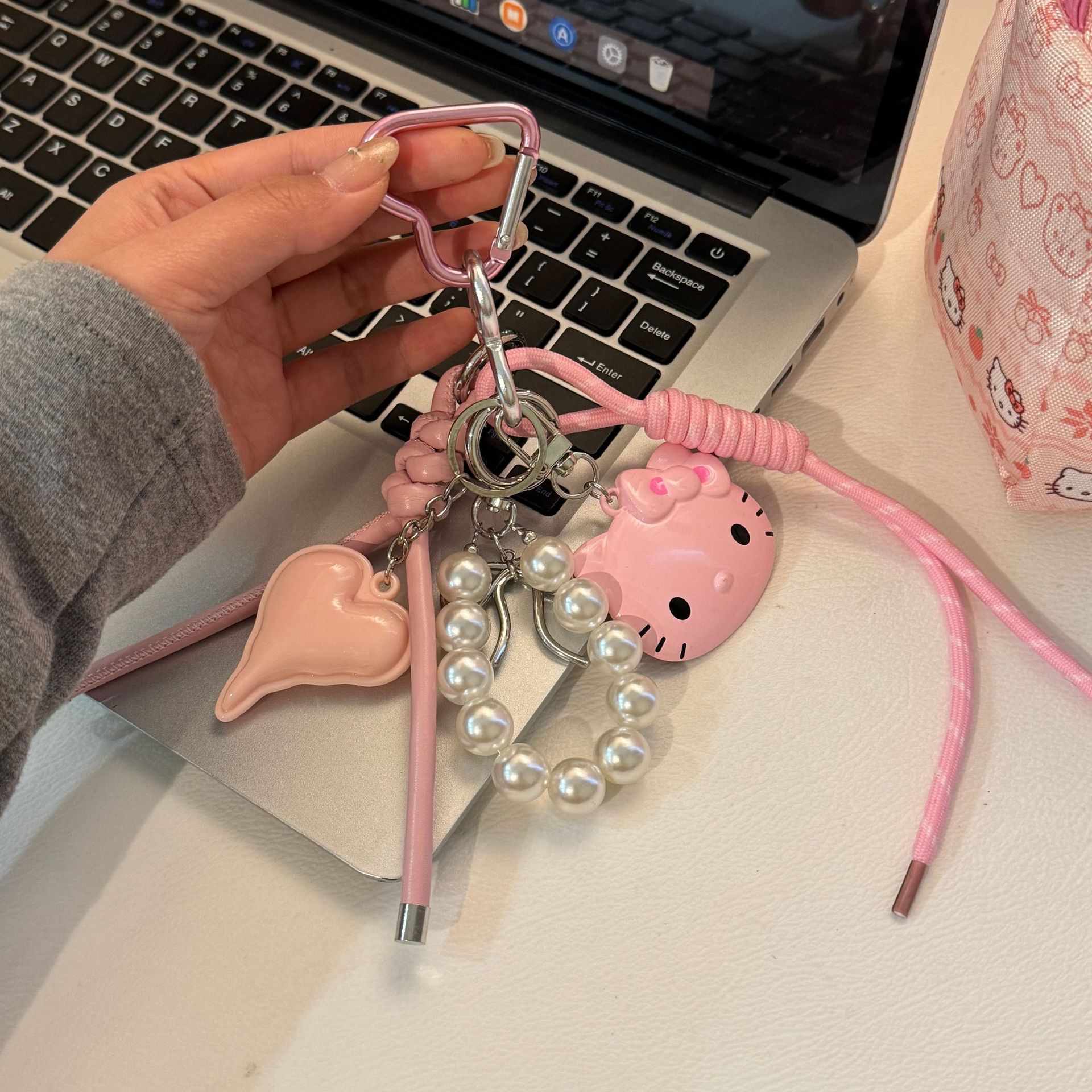 Original DIY hecha a mano colgante rosa KT gato personalidad bolso colgante Miu pareja trenzado colgante bolso colgante