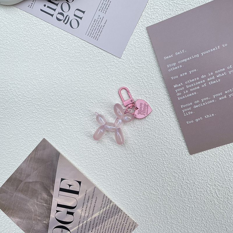 Pequeño Libro Rojo mismo lindo jalea globo láser perro llavero colgante colorido cachorro de dibujos animados teléfono llavero