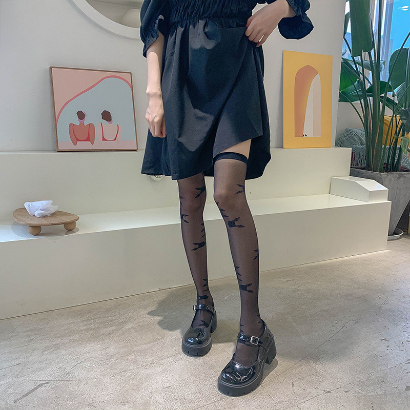 Calcetines por encima de la rodilla de las mujeres ins medias de flores grandes delgadas transparentes estilo JK medias blancas y negras atractivas del color sólido al por mayor