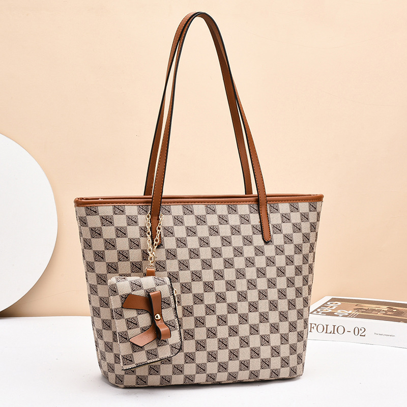 Bolso para mujeres 2025 nueva impresión de moda de gran capacidad bolso de hombro bolso de viaje con bolso de cambio bolso de gran tamaño