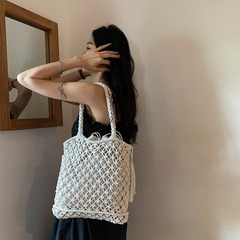 大容量鏤空手工編織包包女夏季新款度假沙灘單肩包休閒水桶草編包