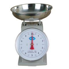 旧式の秤の機械台は家庭用10キロの円盤のスプリングをはかります。