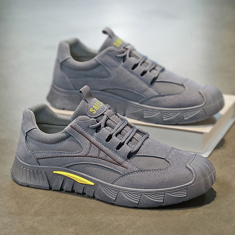 Zapatos de protección laboral para hombres primavera nuevo sitio de trabajo ventilado antideslizante desgaste deportivo zapatos de skate casuales zapatos de trabajo