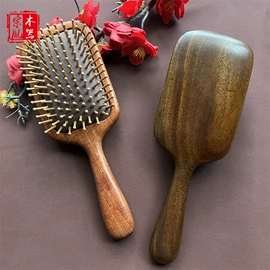 木质工艺品;经络保健器材;美发梳