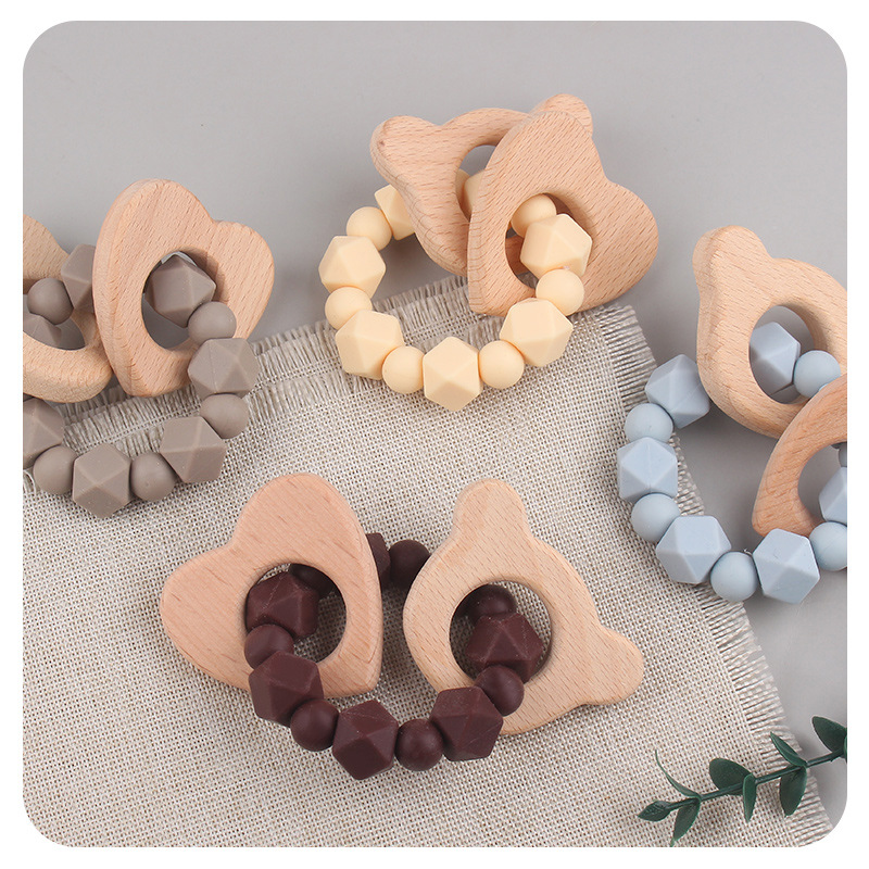 Nuevos artículos para bebés dibujos animados cabeza de haya creativo bebé silicona mordiendo dientes molares pulsera de goma de diente