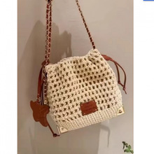 ∅乌托邦小镇水桶包包女夏季编织精致链条单肩斜挎小包