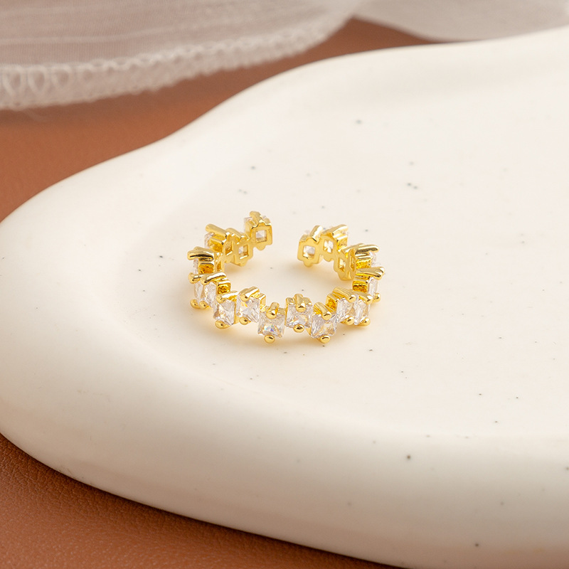 Golden ring with stone with zircon