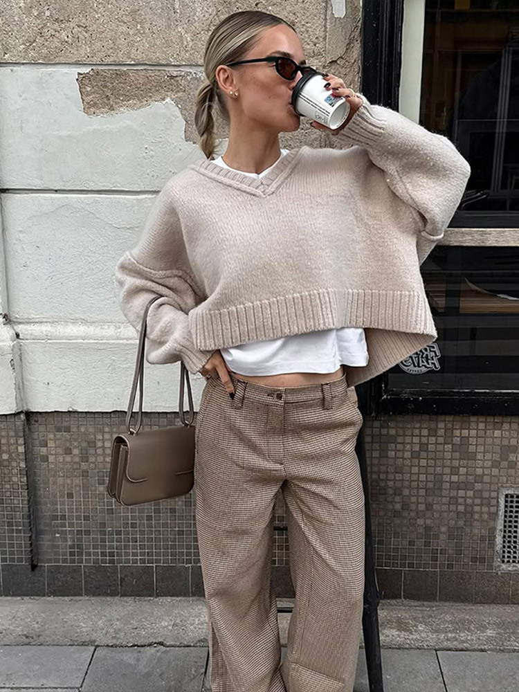 Temperamento de moda universal suelto color sólido cuello en V suéter de manga corta 2025, otoño y invierno nuevo estilo transfronterizo europeo y americano