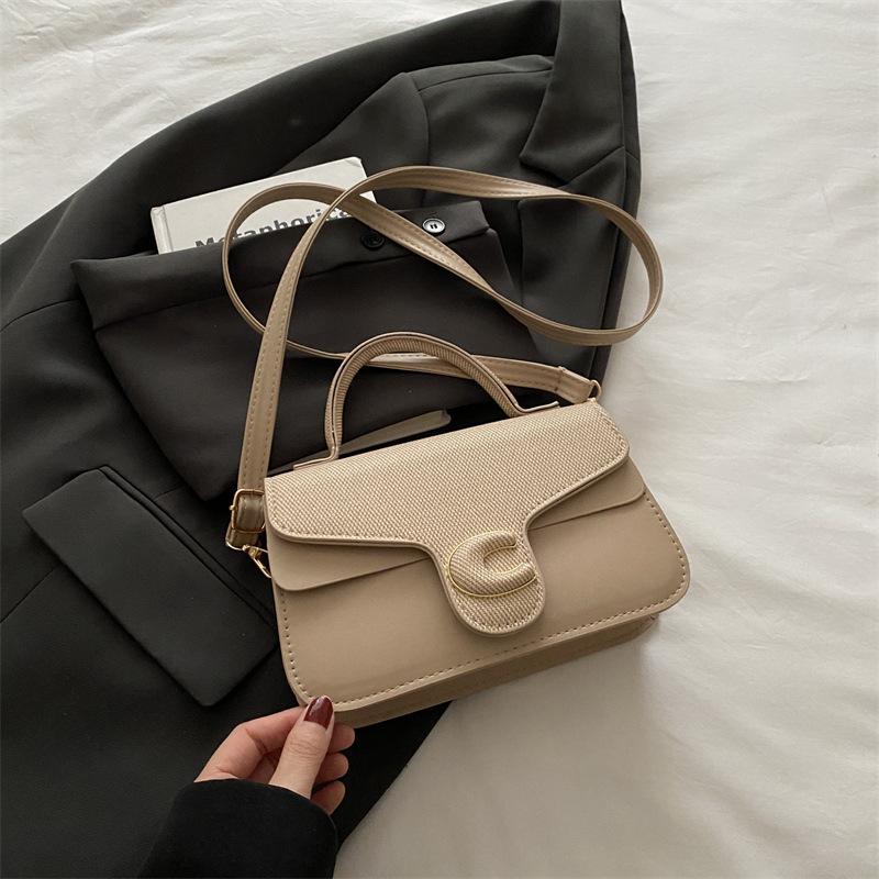 Trendy de verano 2025 nuevo bolso cuadrado pequeño de color en contraste bolso de moda bolso diagonal portátil de textura occidental de todo fósforo para mujer