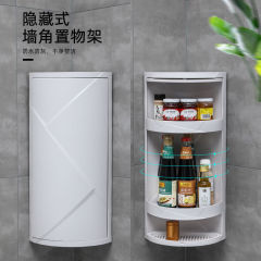 台所の台の上の物置棚の調味料の収納棚の油の瓶の調味料の箱の三脚のかまどの回転する壁のコーナーキャビネット