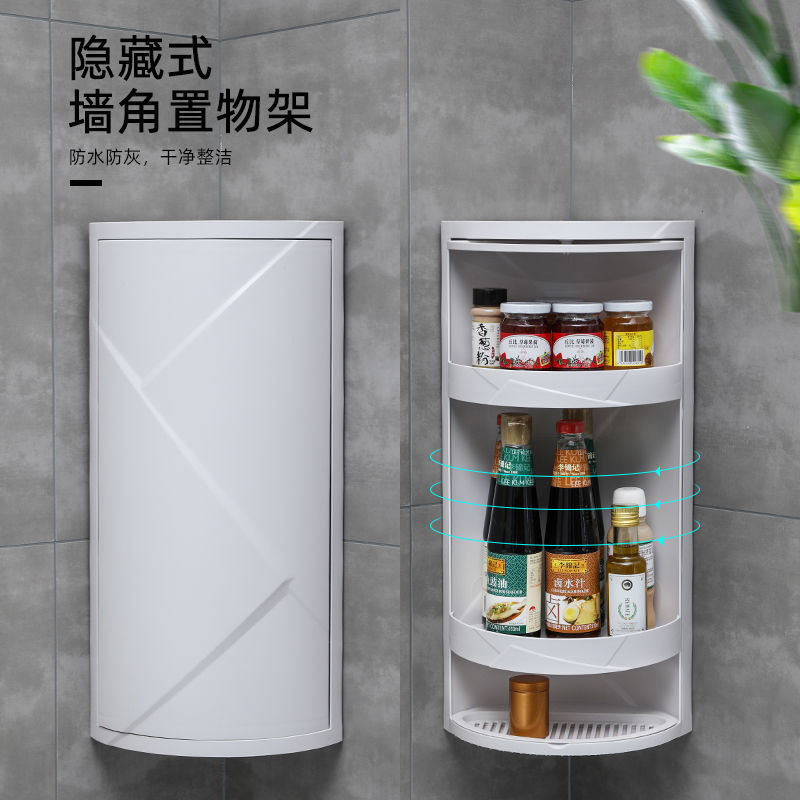 台所の台の上の物置棚の調味料の収納棚の油の瓶の調味料の箱の三脚のかまどの回転する壁のコーナーキャビネット|undefined
