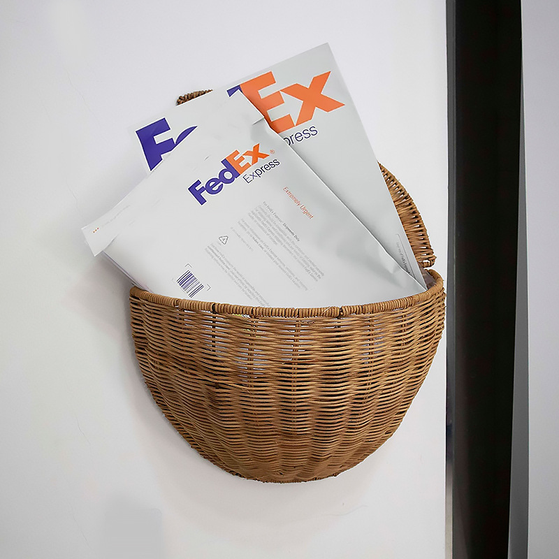 Decoración americana de la casa tela de caña colgante de pared cesto de flores tejido a mano tela de paja colgante cesto de almacenamiento colgante de pared cesto de almacenamiento