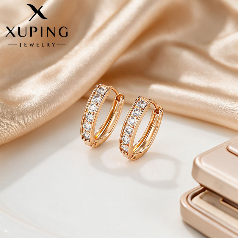 Xuping Europa y los Estados Unidos transfronterizos aleación de cobre chapado 24k aretes de color pernos de orejas incrustados en una sola fila de joyas artificiales orejas al por mayor mujeres