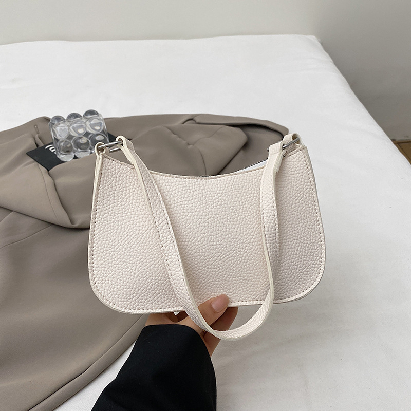 女性のためのソリッドカラーバッグ 2025 新しいバゲットバッグレトロポータブル脇の下バッグ西洋スタイルガールショルダー通勤|undefined