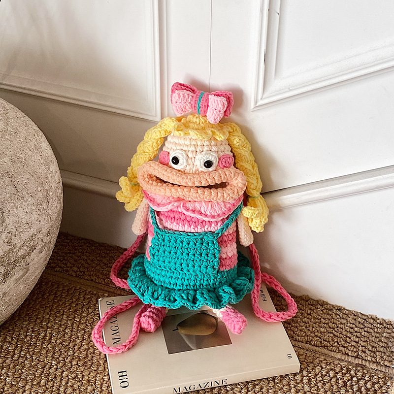 Caricatura encantadora mochila de hombro para niños y niñas ganchillo a mano muñeca de boca grande mochila para niños otoño y invierno nueva bolsa para niños