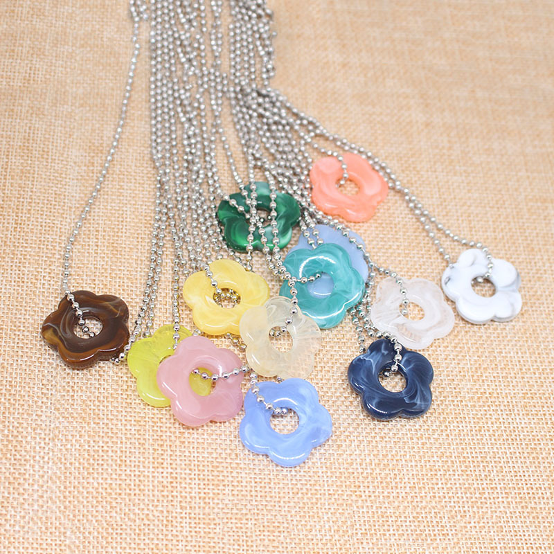 Simple Personality Hollow Flower Necklace Color Flower Sweater Chain Jewelry display picture 1