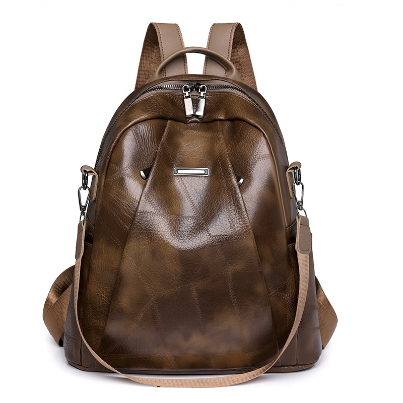 2024 nueva mochila de cuero suave casual para mujer moda retro multifuncional anti-salpicaduras mochila de viaje al por mayor